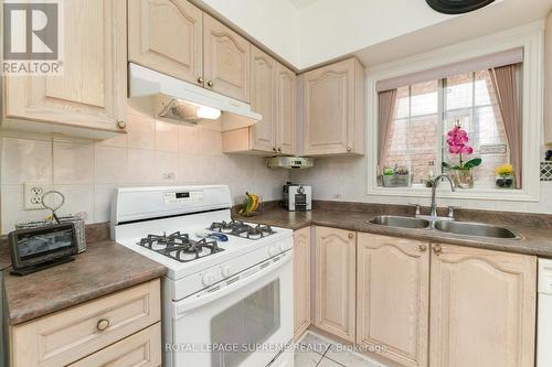 35 Sam Frustaglio Drive, Toronto, ON - Indoor Photo Showing Kitchen With Double Sink