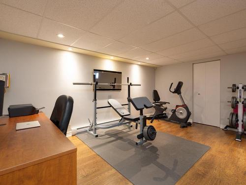 Basement - 232 Rue Cartier, Saint-Eustache, QC - Indoor Photo Showing Gym Room