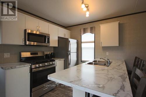 #49 -657 Thunder Bridge Rd, Kawartha Lakes, ON - Indoor Photo Showing Kitchen With Double Sink