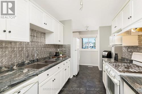 #20 -250 Satok Cres, Milton, ON - Indoor Photo Showing Kitchen With Double Sink