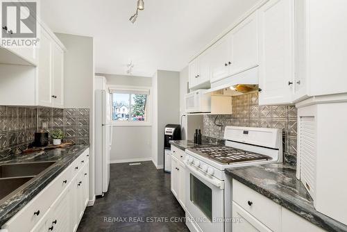 #20 -250 Satok Cres, Milton, ON - Indoor Photo Showing Kitchen With Double Sink