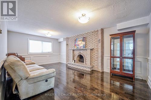 2636 Kennedy Rd, Toronto, ON - Indoor Photo Showing Living Room With Fireplace
