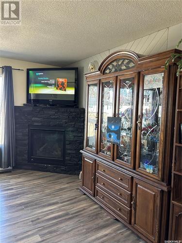 211 3Rd Avenue E, Kelvington, SK - Indoor Photo Showing Other Room With Fireplace