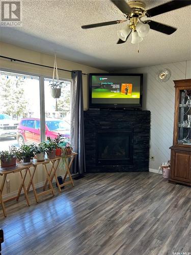 211 3Rd Avenue E, Kelvington, SK - Indoor Photo Showing Other Room With Fireplace