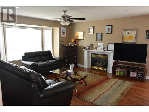 255 Redden Road, Quesnel, BC - Indoor Photo Showing Living Room With Fireplace
