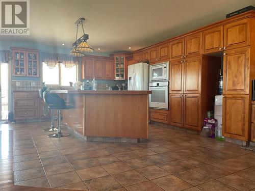 4601 Barber Court, Fort Nelson, BC - Indoor Photo Showing Kitchen