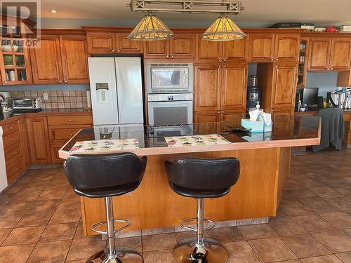 4601 Barber Court, Fort Nelson, BC - Indoor Photo Showing Kitchen