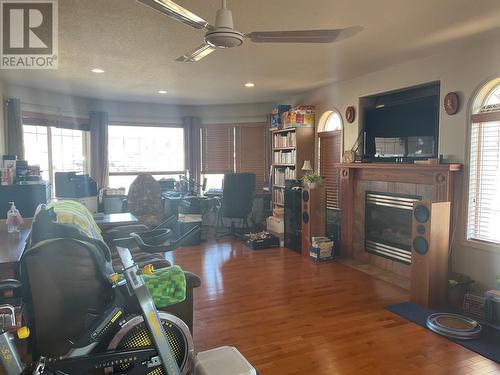 4601 Barber Court, Fort Nelson, BC - Indoor Photo Showing Living Room With Fireplace