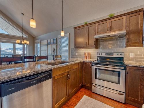 438-6973 Terazona Drive, Kelowna, BC - Indoor Photo Showing Kitchen With Double Sink