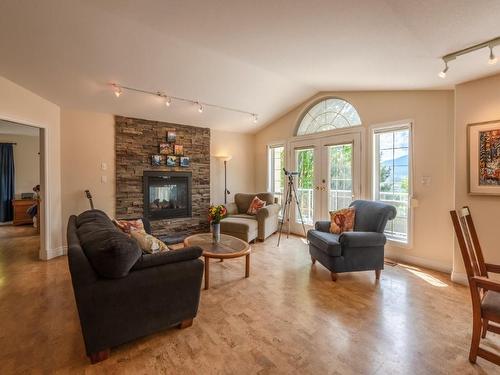 124 Big Horn Trail, Okanagan Falls, BC - Indoor Photo Showing Living Room With Fireplace