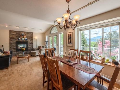 124 Big Horn Trail, Okanagan Falls, BC - Indoor Photo Showing Dining Room With Fireplace