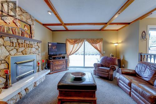 1638 Pritchard Drive, West Kelowna, BC - Indoor Photo Showing Living Room With Fireplace
