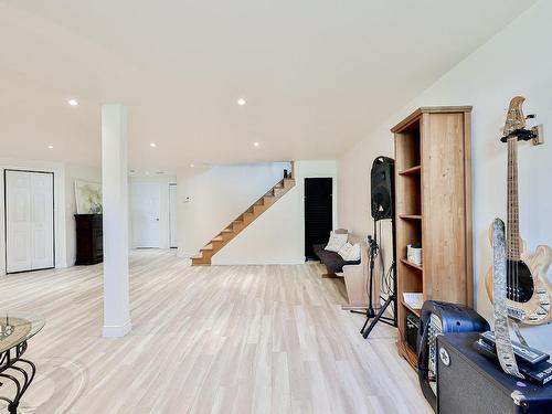 Salle familiale - 25 Rue Clermont, Saint-Lin/Laurentides, QC - Indoor Photo Showing Other Room