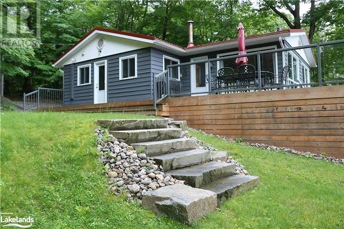 Welcome to 1067 Bruce Lake Drive - 1067 Bruce Lake Drive, Minett, ON - Outdoor With Deck Patio Veranda