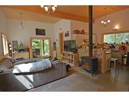 8907 Martens Road, Slocan, BC - Indoor Photo Showing Living Room With Fireplace