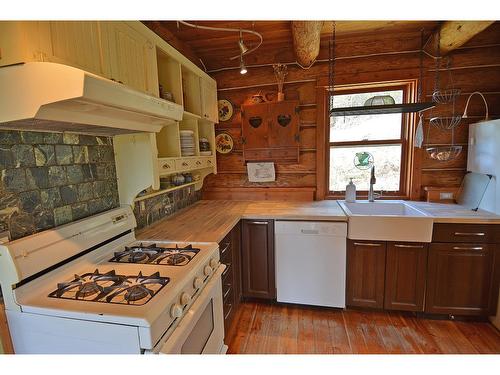 8907 Martens Road, Slocan, BC - Indoor Photo Showing Kitchen With Double Sink