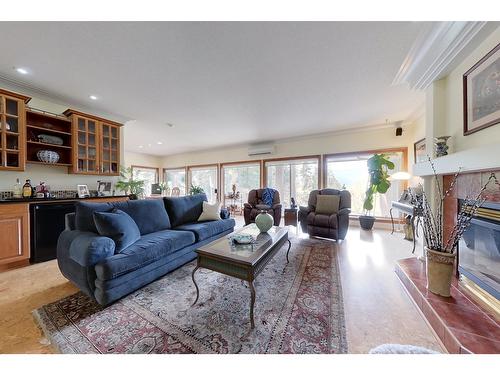 1111 Fox Tree Road, Lister, BC - Indoor Photo Showing Living Room With Fireplace