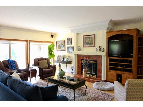 1111 Fox Tree Road, Lister, BC - Indoor Photo Showing Living Room With Fireplace