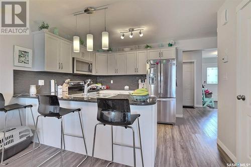 601 2 Savanna Crescent, Pilot Butte, SK - Indoor Photo Showing Kitchen With Stainless Steel Kitchen With Upgraded Kitchen