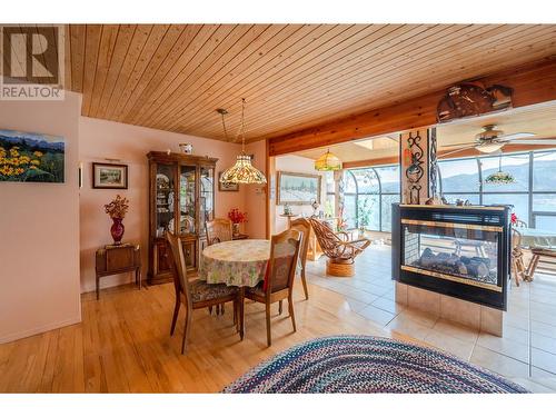 115 Cedar Avenue, Kaleden, BC - Indoor Photo Showing Dining Room With Fireplace