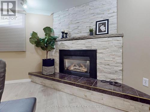 1257 Keewatin Blvd, Peterborough, ON - Indoor Photo Showing Living Room With Fireplace