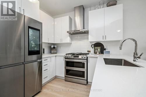 31 Dass Dr W, Centre Wellington, ON - Indoor Photo Showing Kitchen With Stainless Steel Kitchen With Upgraded Kitchen