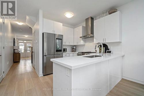31 Dass Drive W, Centre Wellington, ON - Indoor Photo Showing Kitchen With Stainless Steel Kitchen With Upgraded Kitchen