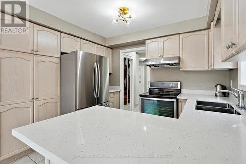 18 Prince Cres, Brampton, ON - Indoor Photo Showing Kitchen With Double Sink