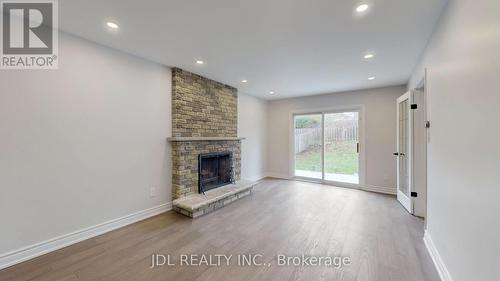 11 Hialeah Cres, Whitby, ON - Indoor Photo Showing Other Room With Fireplace