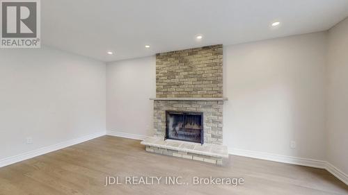 11 Hialeah Cres, Whitby, ON - Indoor With Fireplace