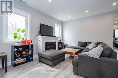 10 Elm Dr, Wasaga Beach, ON - Indoor Photo Showing Living Room With Fireplace