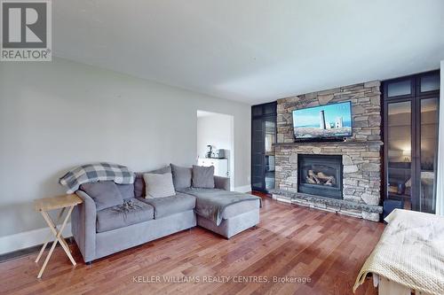 671 Deerfield Cres, Smith-Ennismore-Lakefield, ON - Indoor Photo Showing Living Room With Fireplace