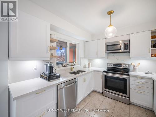 #3 -15 West Deane Park Dr W, Toronto, ON - Indoor Photo Showing Kitchen With Double Sink