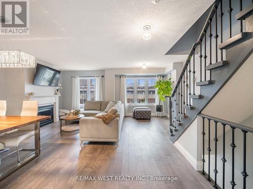 #3 -15 West Deane Park Dr W, Toronto, ON - Indoor Photo Showing Living Room With Fireplace