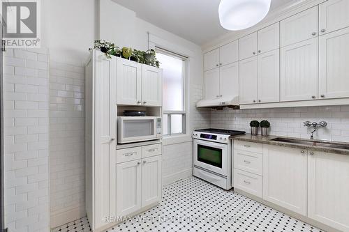 29 Hillside Ave, Toronto, ON - Indoor Photo Showing Kitchen With Double Sink
