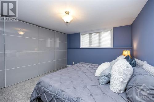 Primary bedroom boasting updated wall closets - 171 Briston Private, Ottawa, ON - Indoor Photo Showing Bedroom