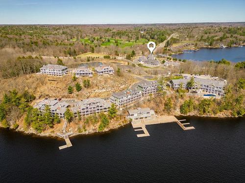 1869 Highway 118 West Road|Unit #A105, Bracebridge, ON - Outdoor With Body Of Water With View