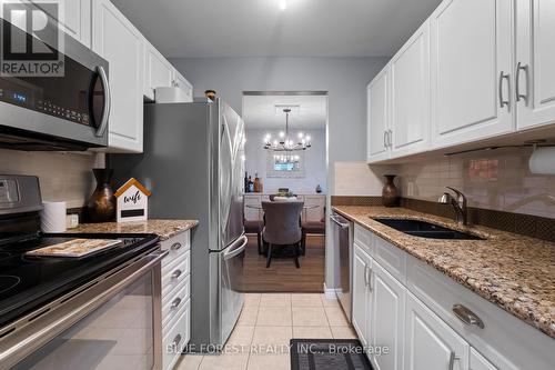 #120 -725 Deveron Cres, London, ON - Indoor Photo Showing Kitchen With Double Sink