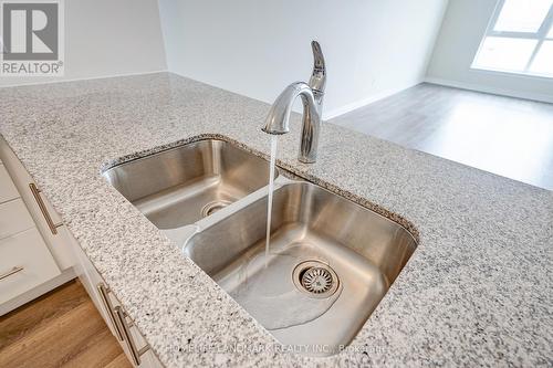 511 - 150 Oak Park Boulevard, Oakville, ON - Indoor Photo Showing Kitchen With Double Sink