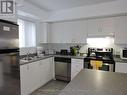 24 - 5035 Oscar Peterson Boulevard, Mississauga (Churchill Meadows), ON  - Indoor Photo Showing Kitchen With Double Sink 