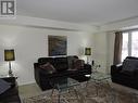 24 - 5035 Oscar Peterson Boulevard, Mississauga, ON  - Indoor Photo Showing Living Room 