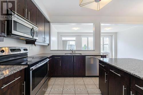 103 Kendall Drive, Milton, ON - Indoor Photo Showing Kitchen With Double Sink