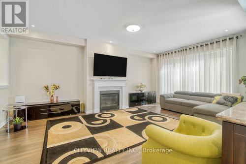 8046 Buckeye Crescent N, Niagara Falls, ON - Indoor Photo Showing Living Room With Fireplace