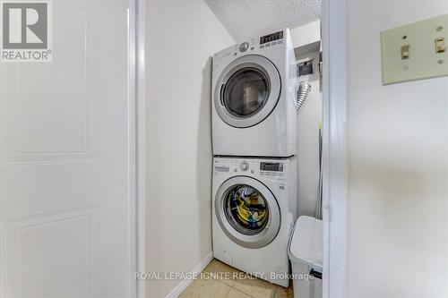 402 - 400 Mclevin Avenue, Toronto, ON - Indoor Photo Showing Laundry Room