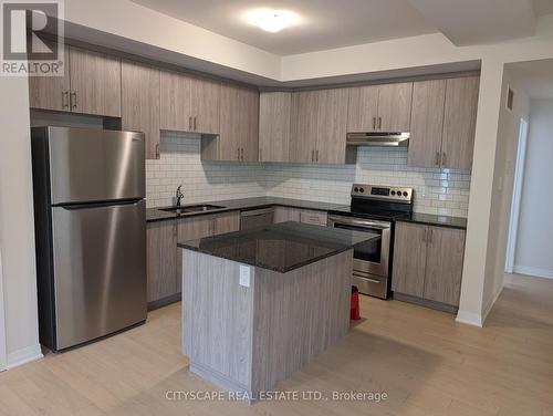 68 - 2 Willow Street, Brant, ON - Indoor Photo Showing Kitchen With Stainless Steel Kitchen