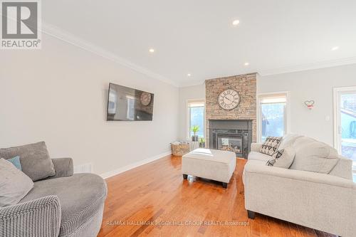 34 Camelot Sq, Barrie, ON - Indoor Photo Showing Living Room With Fireplace
