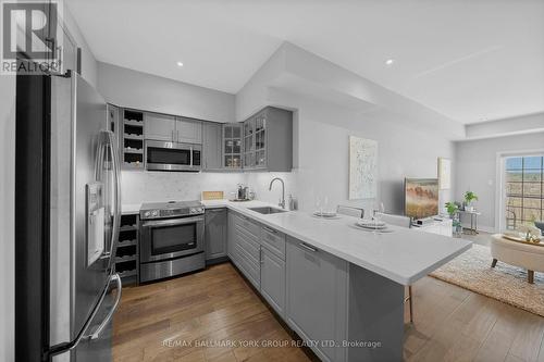 #406 -44 Ferndale Dr S, Barrie, ON - Indoor Photo Showing Kitchen With Stainless Steel Kitchen With Upgraded Kitchen