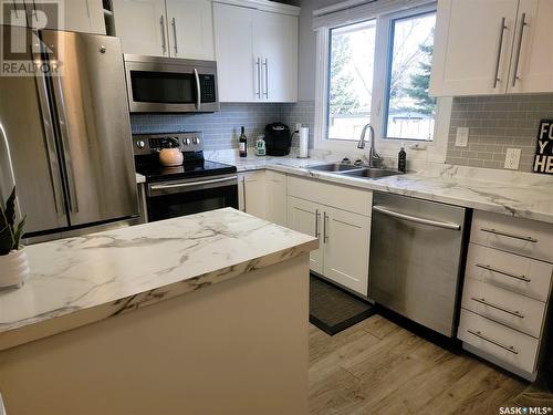 186 1128 Mckercher Drive, Saskatoon, SK - Indoor Photo Showing Kitchen With Double Sink With Upgraded Kitchen