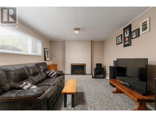 4447 Pinegrove Road, Kelowna, BC - Indoor Photo Showing Other Room With Fireplace