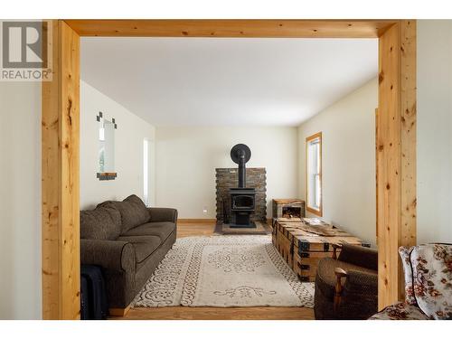5581 Oyama Lake Road, Lake Country, BC - Indoor Photo Showing Living Room With Fireplace